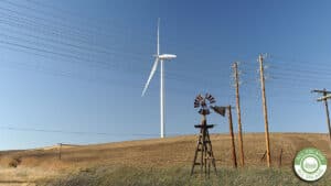 A wind turbine and old windmill in rural Solano County.