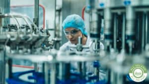 A woman works in a pharmaceutical plant.