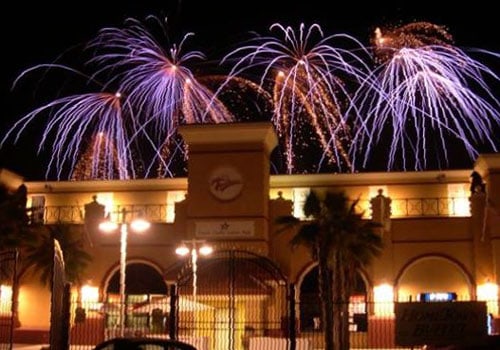 The front of Travis Credit Union Park during a fireworks show.